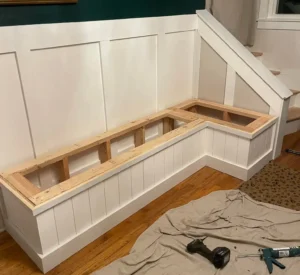 A bench inside a home that's under construction.
