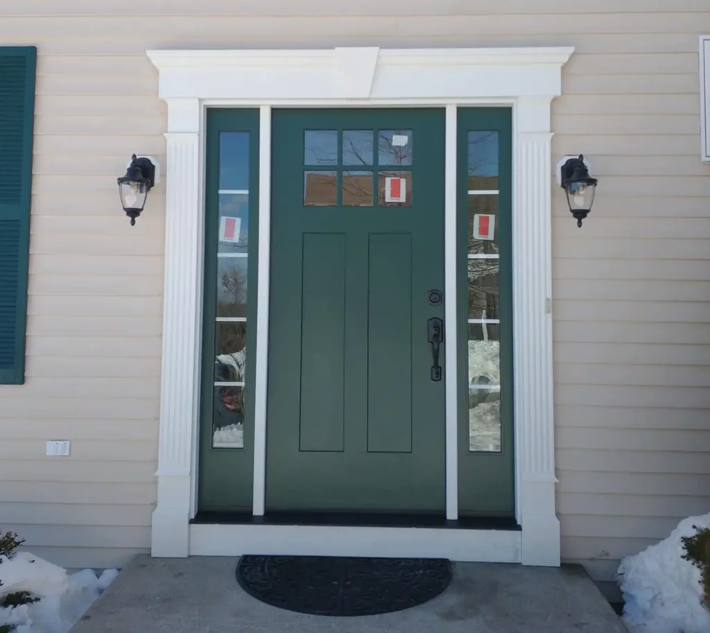 A newly installed green door.